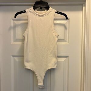 Elegant Cream Sleeveless Bodysuit
